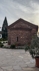 Sofia churches and grazing donkey captured in afternoon footage