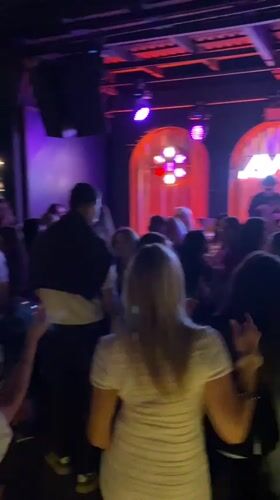 Young adults gather at Barnaul club for evening social event