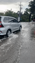 Street flooding disrupts traffic in Kuta, Indonesia