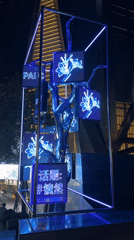 Digital tree art installation displays animated screens in Futian District