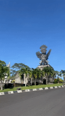 Garuda statue filmed under clear skies in Kuta Selatan