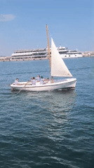 Boats out on Varna Bay with a cruise ship docked nearby