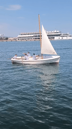 Boats out on Varna Bay with a cruise ship docked nearby