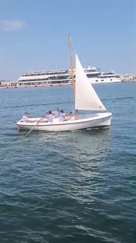 Boats out on Varna Bay with a cruise ship docked nearby