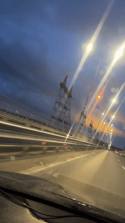 Evening highway travel captured near Urzhumka, Russia at dusk