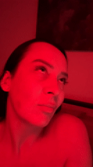 Woman filmed in red lighting in Chaikovsky, Russia