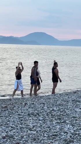 Beachgoers enjoy afternoon leisure time in Fethiye, Turkey