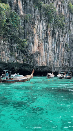 Boat tour through Ao Nang's limestone cliffs and coastline