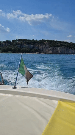 On the water off Sirmione's ruined clifftops, Lake Garda
