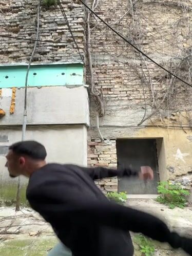 Man smoking captured in alleyway photos in Shumen Bulgaria