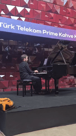 Piano performance captured on stage in Istanbul's Beyoğlu district