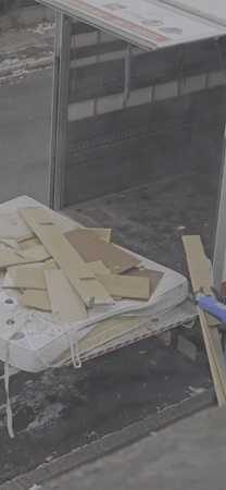 Workers and cluttered desk observed in Luxembourg afternoon