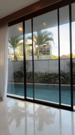 Tourist documents Indonesian resort property interiors and pool areas