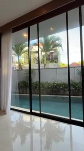 Tourist documents Indonesian resort property interiors and pool areas