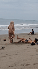 Laid-back beach day in Lhokseumawe with volleyball and ocean wading