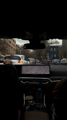 Driver uses GPS navigation system on Yerevan city streets