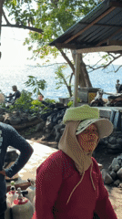 Divers prepare for underwater activities at Indonesian beach