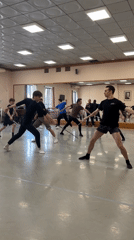 Ballet and stage combat rehearsal in a mirrored dance studio
