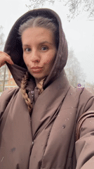 Woman documents makeup routine, outdoor content in Klin, Russia