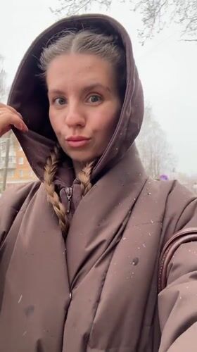 Woman documents makeup routine, outdoor content in Klin, Russia