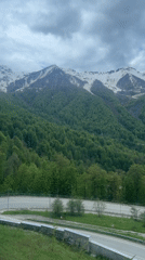Morning cable car rides capture scenic Russian mountain views