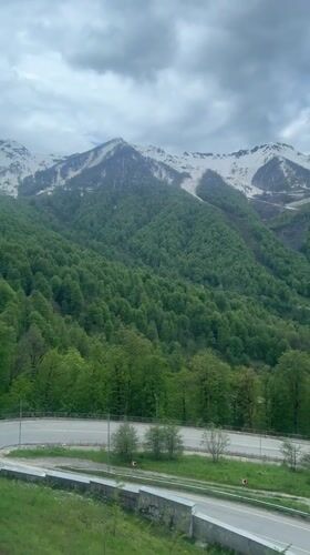 Morning cable car rides capture scenic Russian mountain views