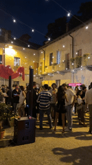 YOOX-branded outdoor evening event in Milan with live brass band