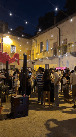 YOOX-branded outdoor evening event in Milan with live brass band