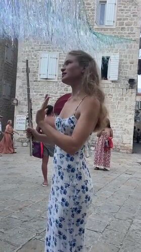 Tourists fill Budva's Old Town streets on a summer afternoon