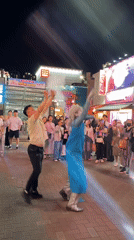 Frozen-costumed street performer entertains crowds in downtown Daegu