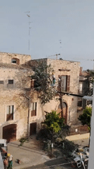 Tree trimming and street work underway in Bitonto, Italy