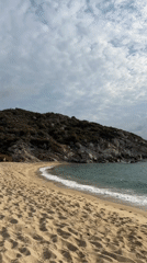 Calm morning at a sandy beach in Toroni, Greece