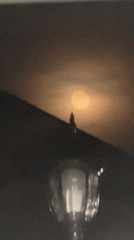 Hazy moon observed through clouds in Gyumri, Armenia
