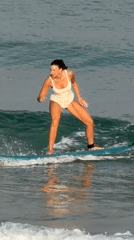 Surf session and beach activity on a Tel Aviv morning