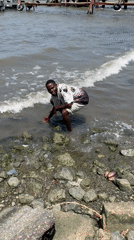 People gather at Ikorodu waterfront for casual shoreline activities