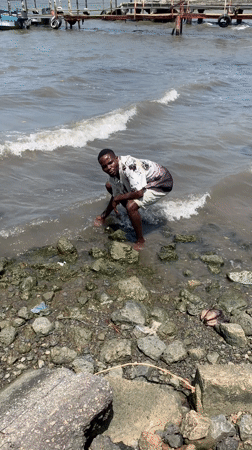 People gather at Ikorodu waterfront for casual shoreline activities