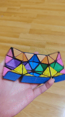 Person holds colorful geometric puzzle in Sliven, Bulgaria
