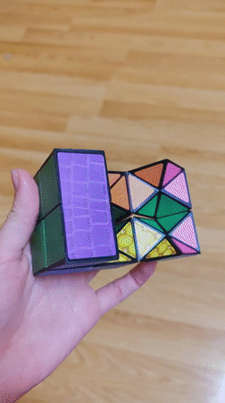 Person holds colorful geometric puzzle in Sliven, Bulgaria