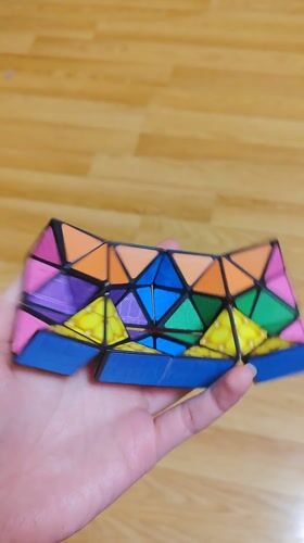 Person holds colorful geometric puzzle in Sliven, Bulgaria