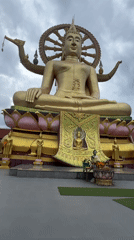 Tourist rings temple bells at Big Buddha Thailand