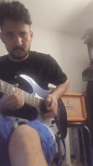 Late-night guitar performance captured in Pueblo Libre, Peru