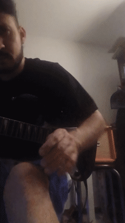 Late-night guitar performance captured in Pueblo Libre, Peru