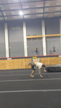 Late-night gymnastics training session documented at Buenos Aires facility