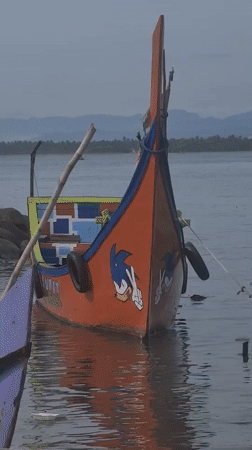Sonic-decorated orange boat spotted moored in Lhokseumawe waters