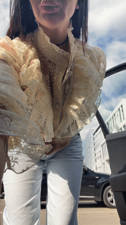 Woman photographed by car in Voronezh parking lot