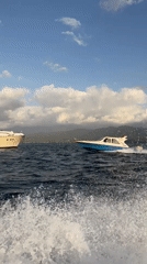 Speedboat crossing open water off the Indonesian coast