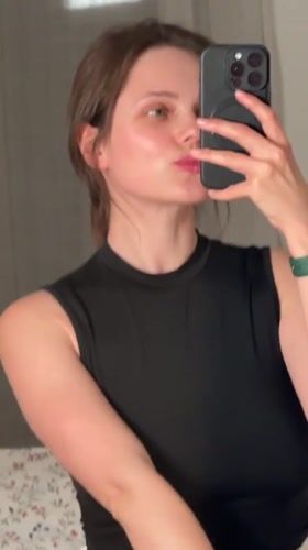 Woman takes bedroom mirror selfies in Balatonlelle, Hungary