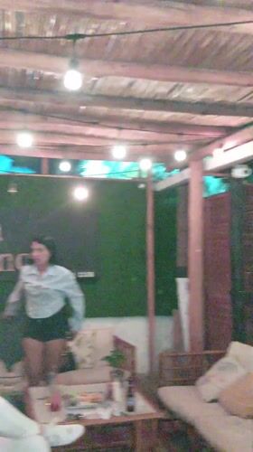 Evening bar scene captured in Porlamar, Venezuela