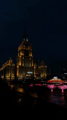 Hotel Radisson Collection Moscow illuminated in nighttime cityscape video