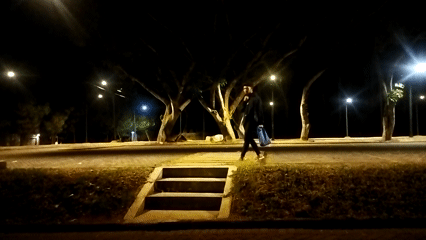 Quiet night streets of Semarang, lit and in motion